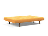 Recast Dark Styletto sovesofa i 536 Bouclé Ochre, slået ud til seng