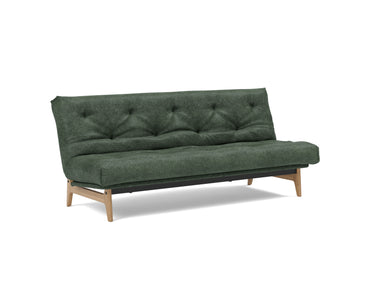 Aslak 120 sovesofa med Spring madras i 281 Avella Pine Green, set skråt forfra