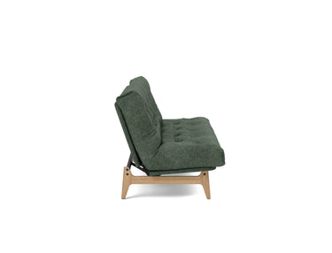 Aslak 120 sovesofa med Spring madras i 281 Avella Pine Green, set fra siden