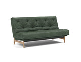 Aslak 140 sovesofa med Soft Spring madras i 281 Avella Pine Green, set skråt forfra