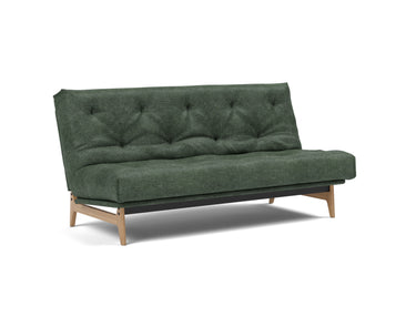 Aslak 140 sovesofa med Soft Spring madras i 281 Avella Pine Green, set skråt forfra