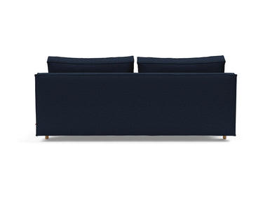 Sly Wood sovesofa i 528 Mixed Dance Blue, set bagfra