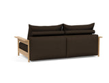Malloy Wood sovesofa i 358 Taura Chocco, set skråt bagfra