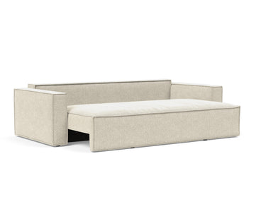 Newilla sovesofa i 357 Taura Off White, med sædet trukket halvt ud