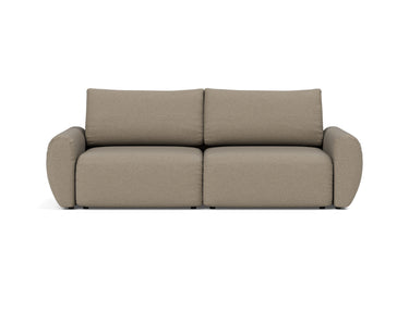 Norum sovesofa med Curve armlæn i 850 Mahoga Caramel, set forfra