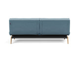 Splitback Eik sovesofa i 525 Mixed Dance Light Blue, set bagfra