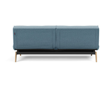 Splitback Eik sovesofa i 525 Mixed Dance Light Blue, set bagfra