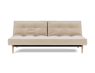 Splitback Styletto Light Wood sovesofa i 410 Esina Almond, set forfra