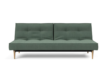 Splitback Styletto Light Wood sovesofa i 518 Elegance Green, set forfra