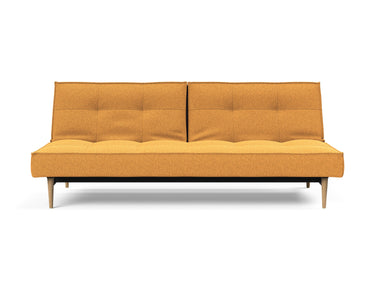 Splitback Styletto Light Wood sovesofa i 536 Bouclé Ochre, set forfra