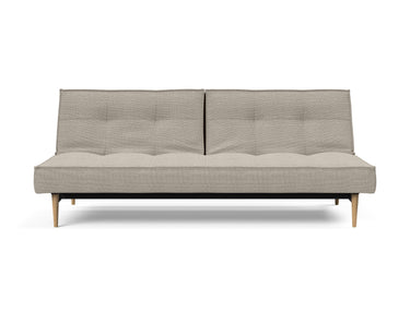 Splitback Styletto Light Wood sovesofa i 579 Kenya Gravel, set forfra