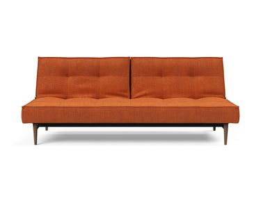 Splitback Styletto Dark Wood sovesofa i 412 Esina Rust, set forfra