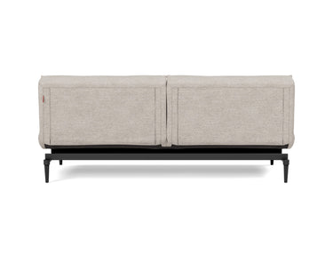 Splitback Styletto Black Wood sovesofa i 471 Yuveno Sand, set bagfra