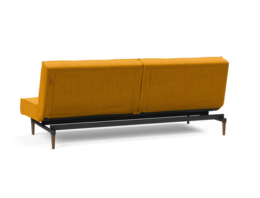 Splitback Styletto Dark Wood sovesofa i 507 Elegance Burned Curry, set skråt bagfra