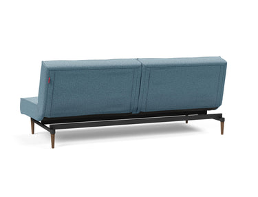 Splitback Styletto Dark Wood sovesofa i 525 Mixed Dance Light Blue, set skråt bagfra