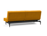 Splitback Styletto Black Wood sovesofa i 507 Elegance Burned Curry, set skråt bagfra