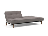 Splitback Styletto Dark Wood sovesofa i 521 Mixed Dance Grey, med den ene ryghalvdel lagt ned