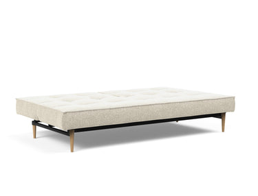 Splitback Styletto Light Wood sovesofa i 357 Taura Off White, slået ud til seng