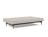 Splitback Styletto Dark Wood sovesofa i 471 Yuveno Sand, slået ud til seng