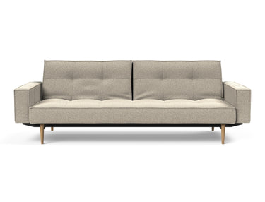 Splitback Styletto Light Wood sovesofa med armlæn i 539 Bouclé Beige, set forfra