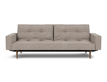 Splitback Styletto Dark Wood sovesofa med armlæn i 472 Yuveno Warm Grey, set forfra