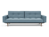Splitback Styletto Dark Wood sovesofa med armlæn i 525 Mixed Dance Light Blue, set forfra