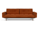 Splitback Styletto Dark Wood sovesofa med armlæn i 595 Corduroy Burnt Orange, set forfra