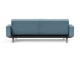 Splitback Styletto Dark Wood sovesofa med armlæn i 525 Mixed Dance Light Blue, set bagfra