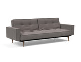 Splitback Styletto Dark Wood sovesofa med armlæn i 521 Mixed Dance Grey, set skråt forfra