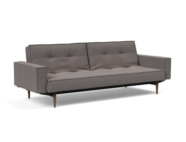 Splitback Styletto Dark Wood sovesofa med armlæn i 521 Mixed Dance Grey, set skråt forfra