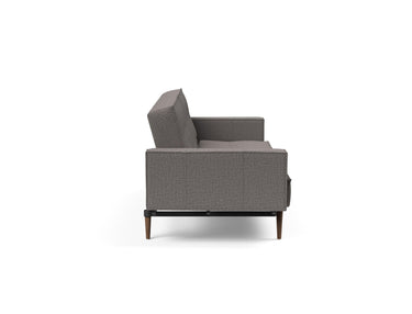Splitback Styletto Dark Wood sovesofa med armlæn i 521 Mixed Dance Grey, set fra siden