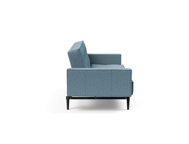 Splitback Styletto Black Wood sovesofa med armlæn i 525 Mixed Dance Light Blue, set fra siden