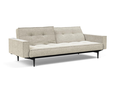 Splitback Styletto Black Wood sovesofa med armlæn i 357 Taura Off White, med den ene ryghalvdel lænet tilbage