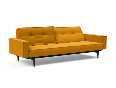 Splitback Styletto Black Wood sovesofa med armlæn i 507 Elegance Burned Curry, med den ene ryghalvdel lænet tilbage