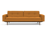 Dublexo Styletto Dark Wood sovesofa med armlæn i 893 Mozart Masala, set forfra