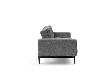 Dublexo Styletto Black Wood sovesofa med armlæn i 563 Twist Charcoal, set fra siden