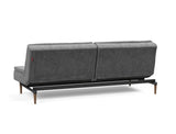 Dublexo Styletto Dark Wood sovesofa i 563 Twist Charcoal, set skråt bagfra