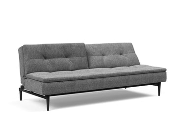Dublexo Styletto Black Wood sovesofa i 563 Twist Charcoal, med den ene ryghalvdel lænet tilbage
