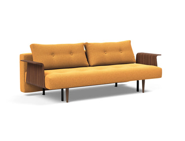 Recast Dark Styletto sovesofa med armlæn i 536 Bouclé Ochre, set skråt forfra