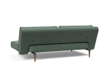 Unfurl Lounger sovesofa i 518 Elegance Green, set skråt bagfra