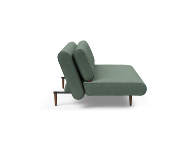 Unfurl Lounger sovesofa i 518 Elegance Green, set fra siden