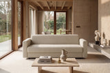 Killian 160 sovesofa med Dual madras i 539 Bouclé Beige i en stue