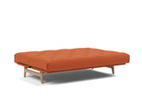 Aslak 140 sovesofa med Soft Spring madras i 412 Esina Rust Orange, slået ud til seng