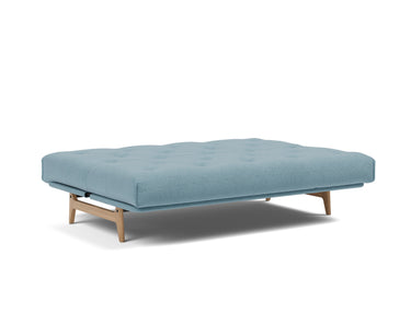 Aslak 140 sovesofa med Soft Spring madras i 525 Mixed Dance Light Blue, slået ud til seng