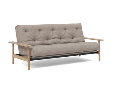 Balder sovesofa med Spring madras i 472 Yuveno Warm Grey, set skråt forfra