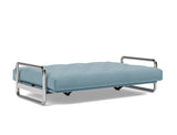 Lomira sovesofa med Spring madras i 525 Mixed Dance Light Blue, slået ud til seng