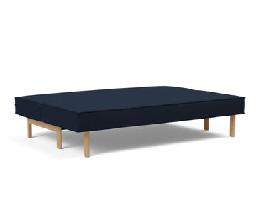 Sly Wood sovesofa i 528 Mixed Dance Blue, slået ud til seng