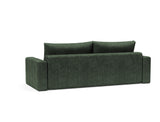 Akello sovesofa med armlæn i 281 Avella Pine Green, set skråt bagfra