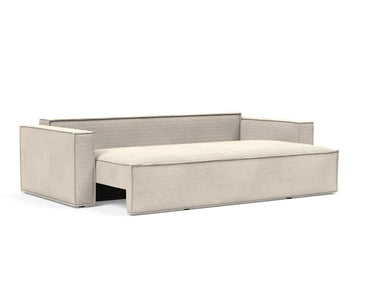 Newilla sovesofa i 594 Corduroy Ivory, med sædet trukket halvt ud
