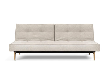 Splitback Styletto Light Wood sovesofa i 280 Avella Sand, set forfra